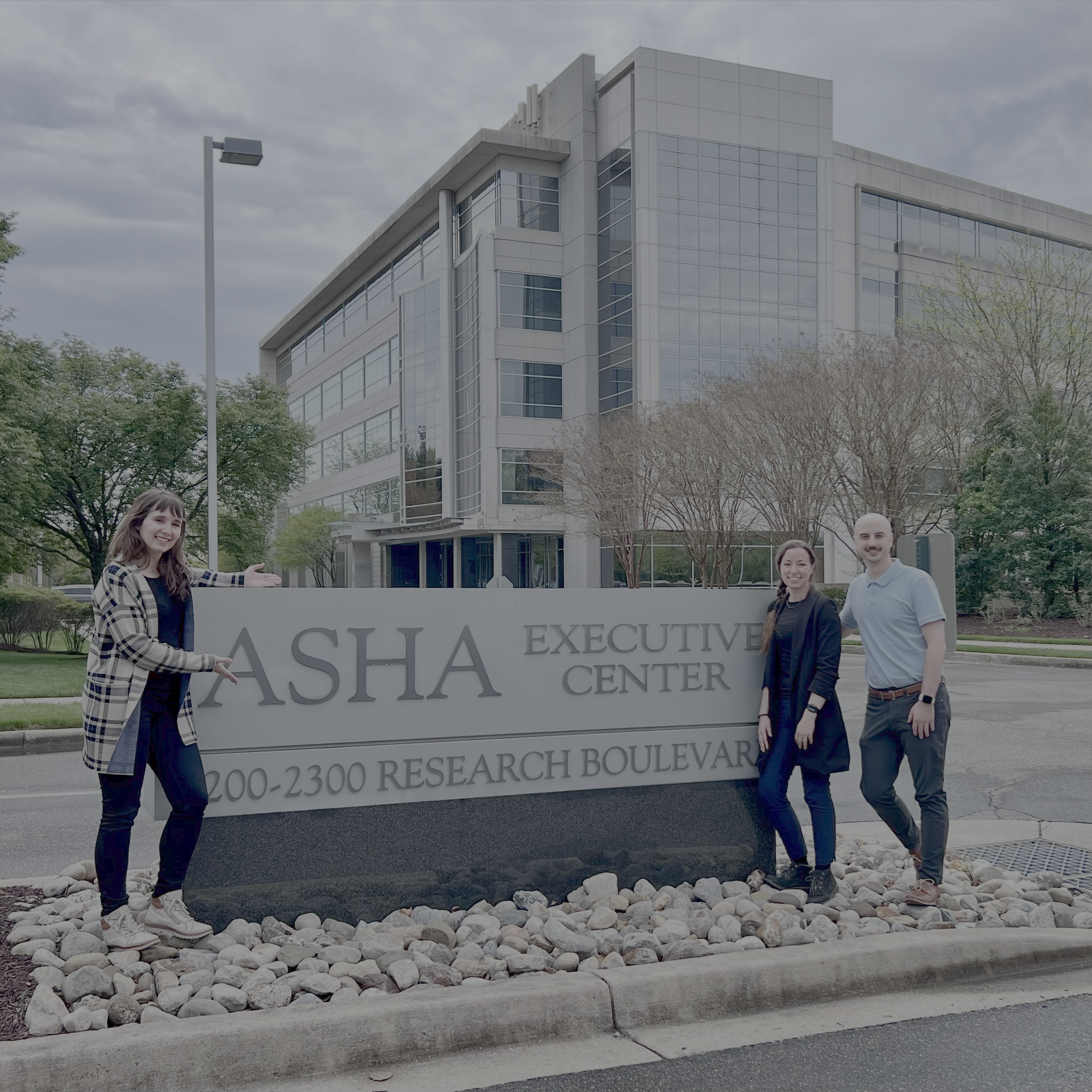 From left to right: Gemma Moya-Galé, Nina Benway, and me in front of the ASHA headquarters.